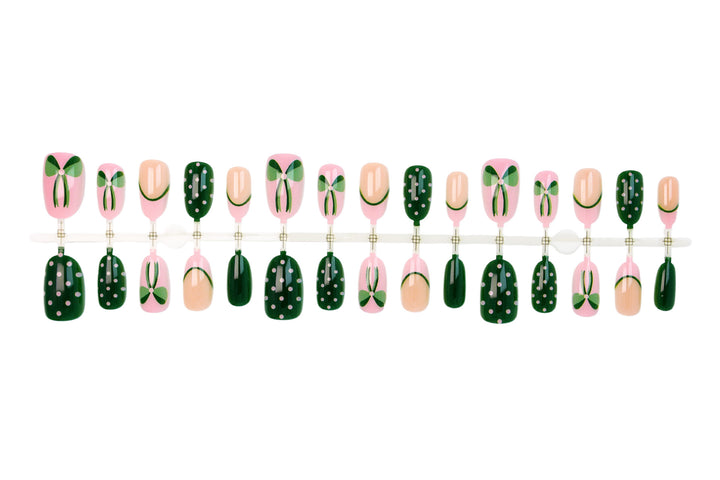 Art nail set with floral accents and playful designs Kalsten