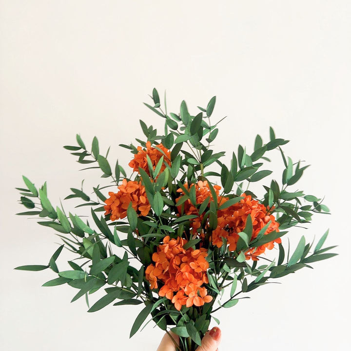 Lifelike Floral Bouquet with Green Foliage