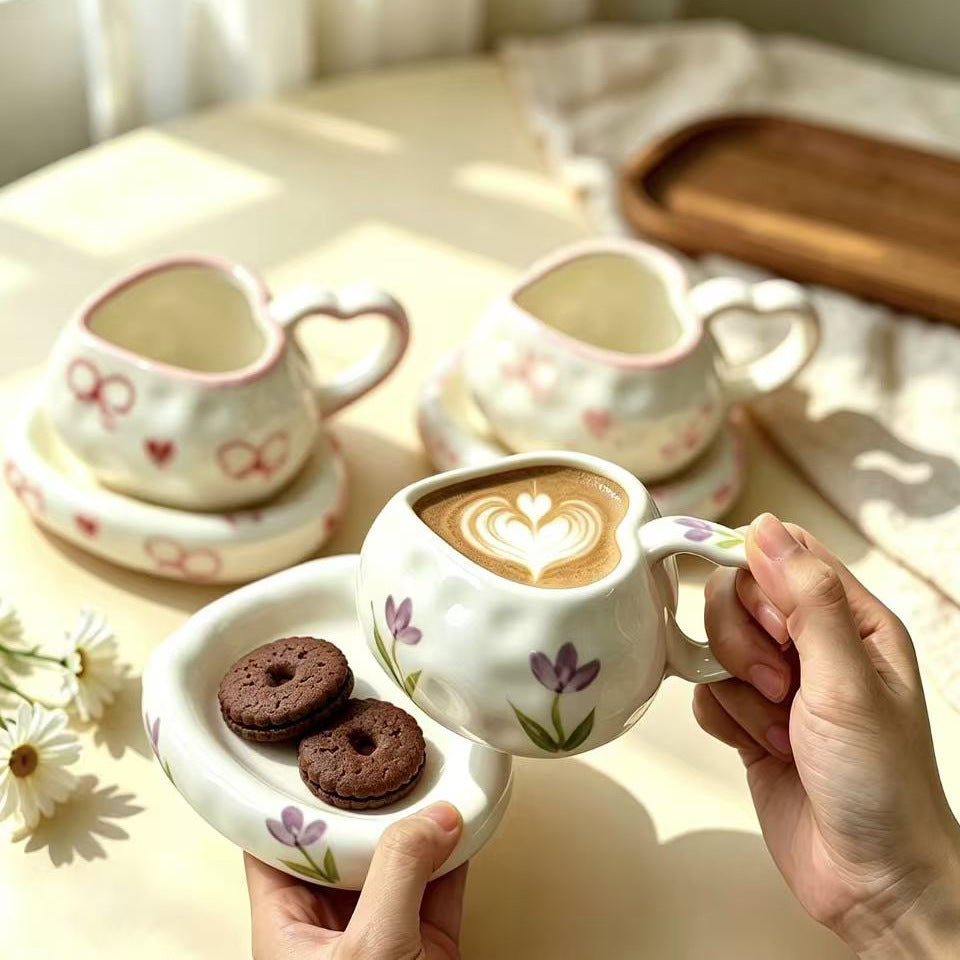 Heart-shaped ceramic cup set with saucer