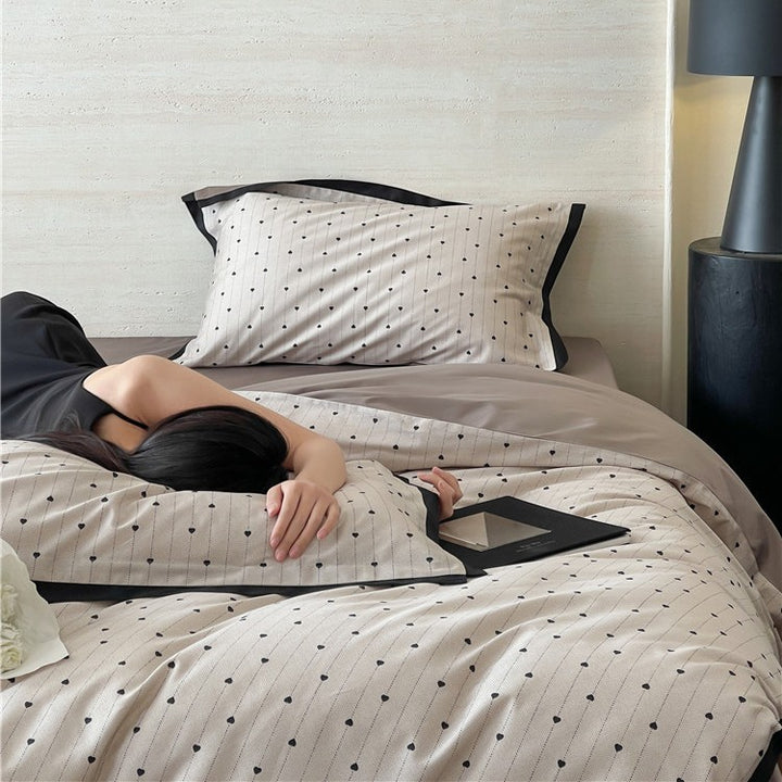 Luxurious cotton satin bedding set with butterfly motif and contrasting frame edge