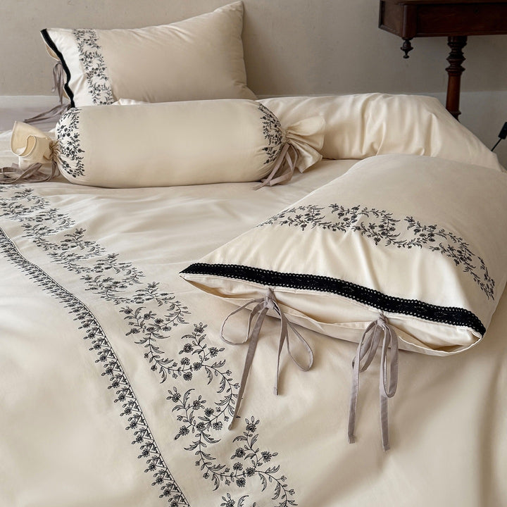 Luxury bedding set with embroidered border detail