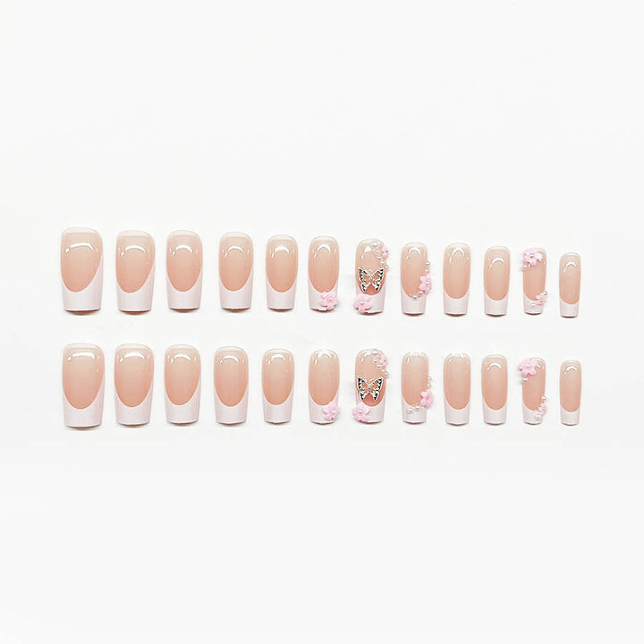 Artificial nail set with playful 3D flowers and glitter accents Kalsten