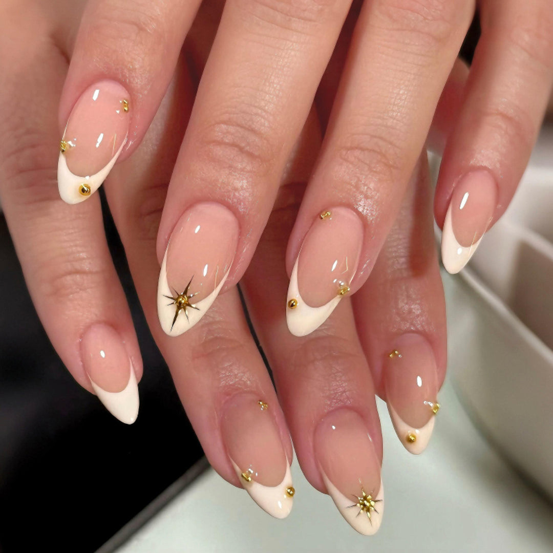 Glamorous stiletto nails with elegant star design Kalsten