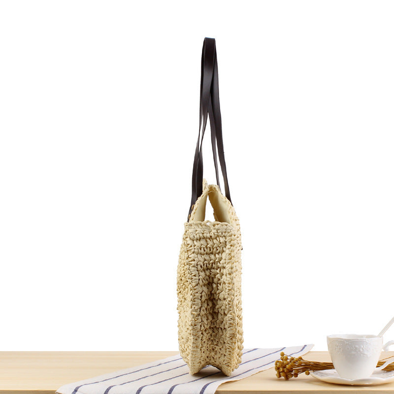 Round basket bag with sturdy leather handles Kalsten