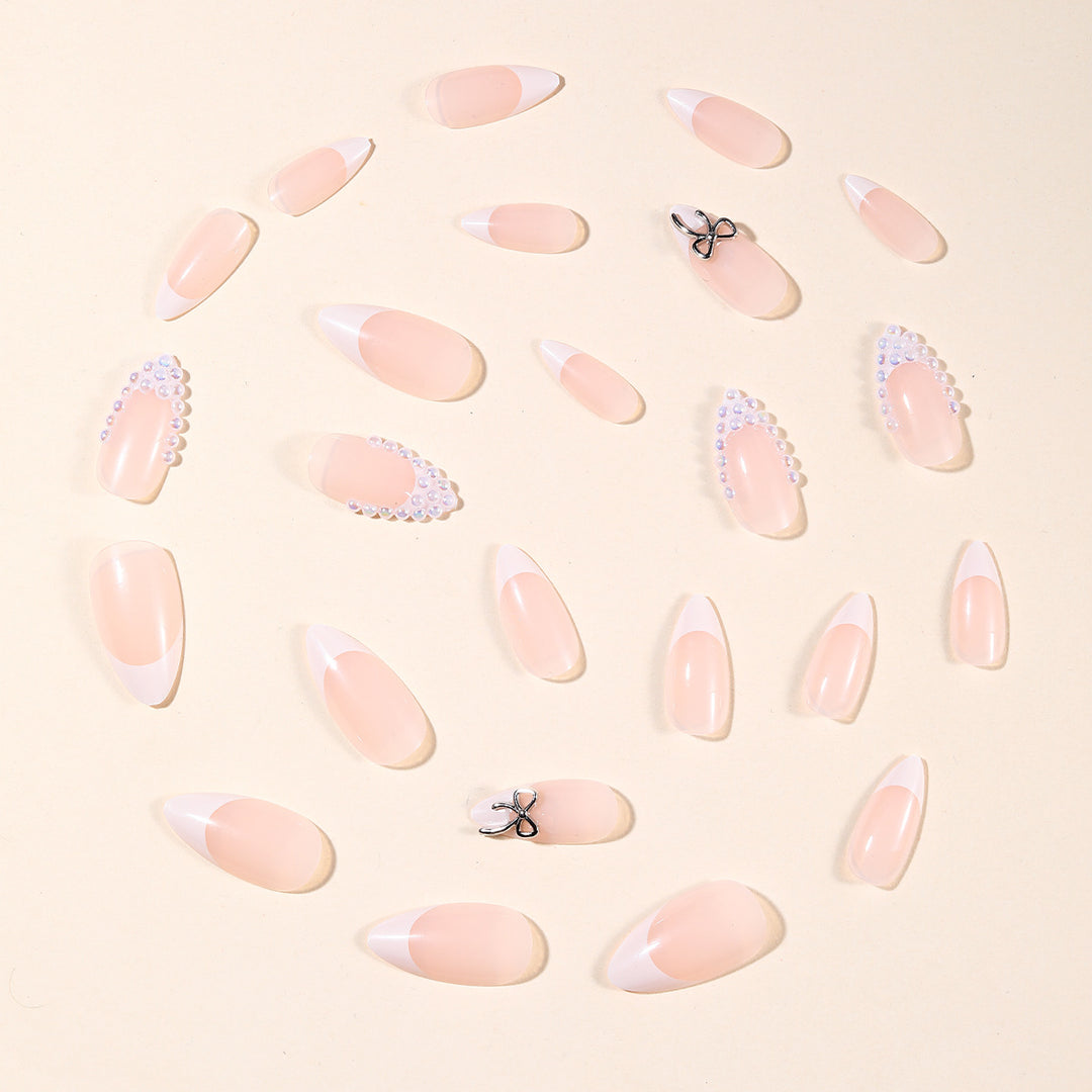 Elegant Pearl-Accentuated Stiletto Nail Art Kalsten