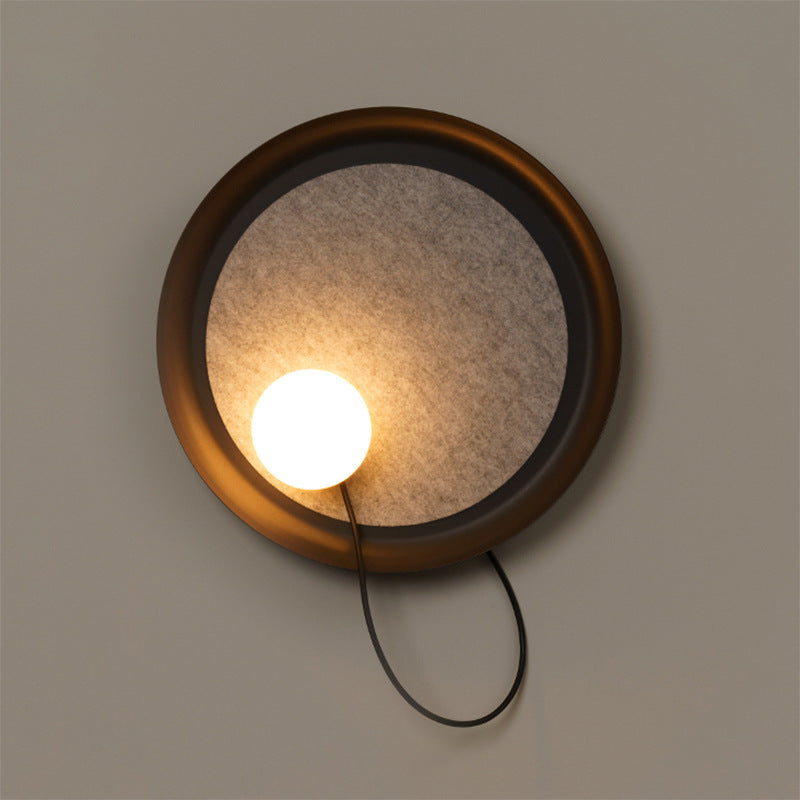 Modern Wall Sconce with Fabric Backdrop and Soft Glow
