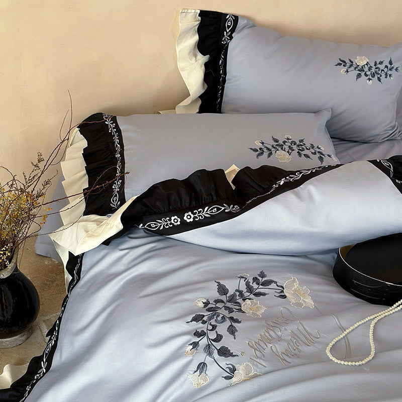 Elegant bed linen set made of cotton satin with embroidery, contrasting frill and round cushion