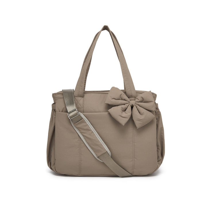 Fashionable tote bag with elegant bow appliqué Kalsten