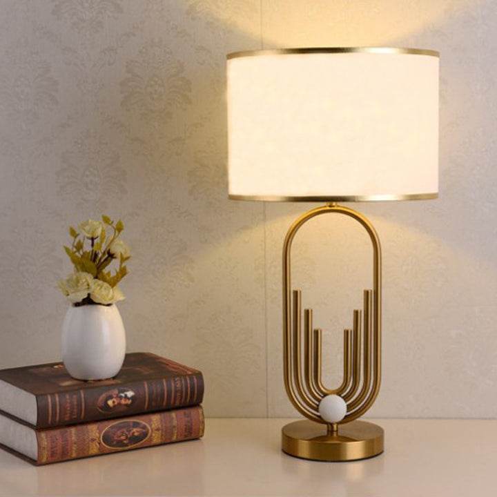 Artistic Table Lamp with Gold and Cream Features