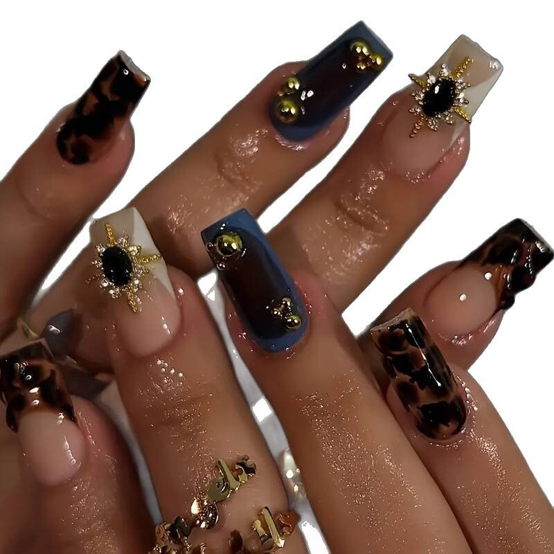 Artistic Patterned Press-On Nail Set with Decorative Elements Kalsten