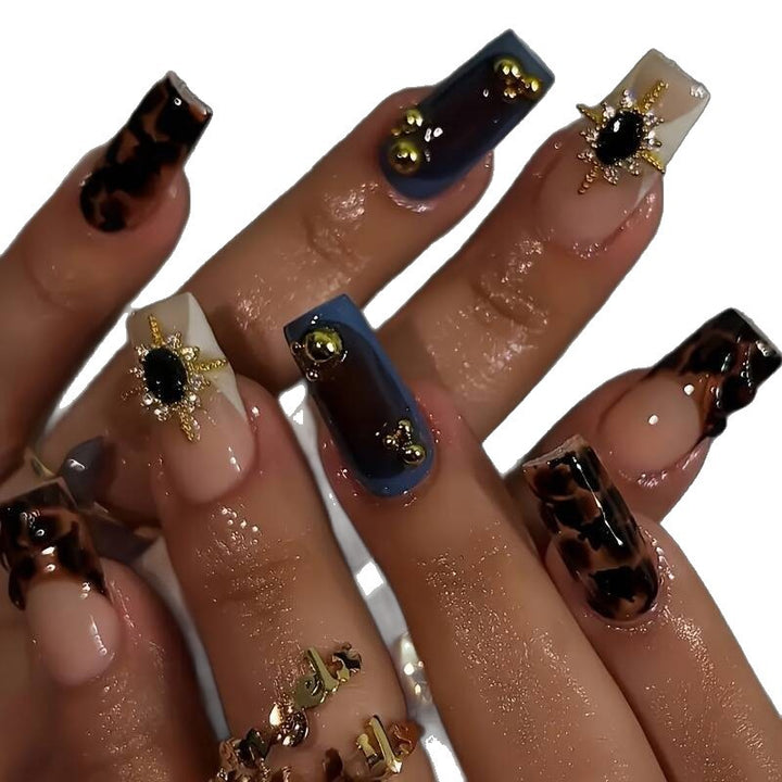 Artistic Patterned Press-On Nail Set with Decorative Elements Kalsten