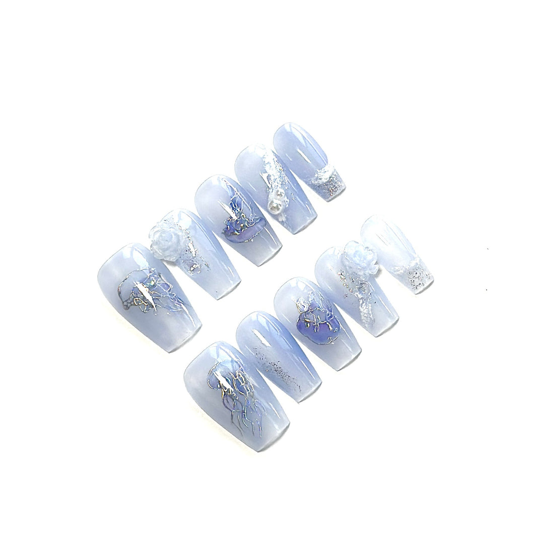 Artistic Press-On Nail Set with Sea-Inspired Designs