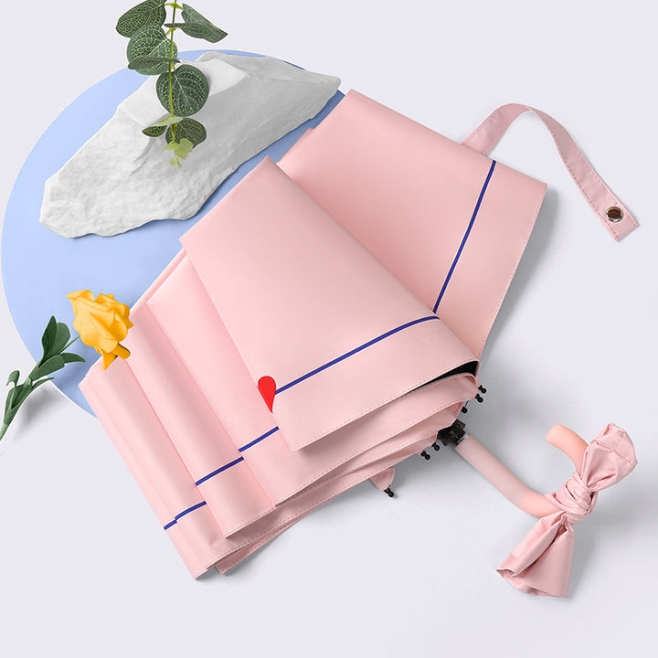 Ladies elegant folding umbrella with ergonomic wooden handle and protective carrying case Kalsten