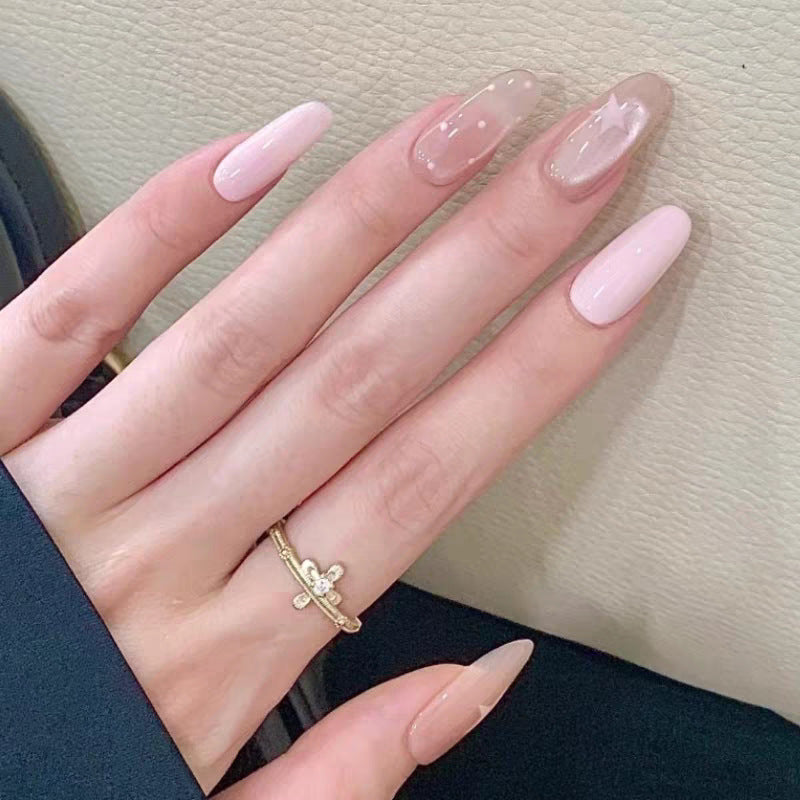 Artistic Press-On Nail Design with Floral and Gemstone Accents Kalsten