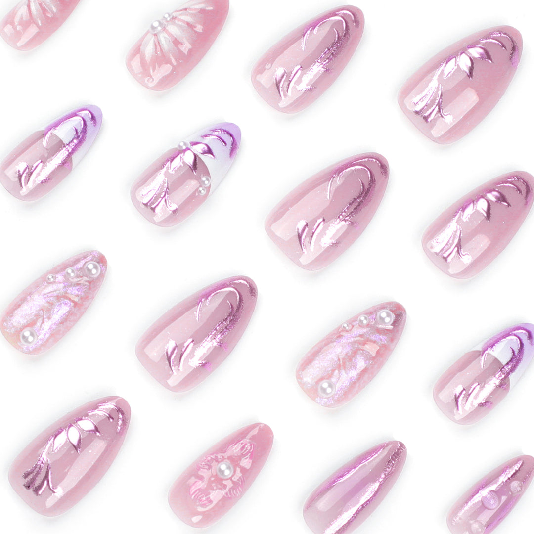 Artificial nail extensions with delicate floral designs and glitter accents Kalsten