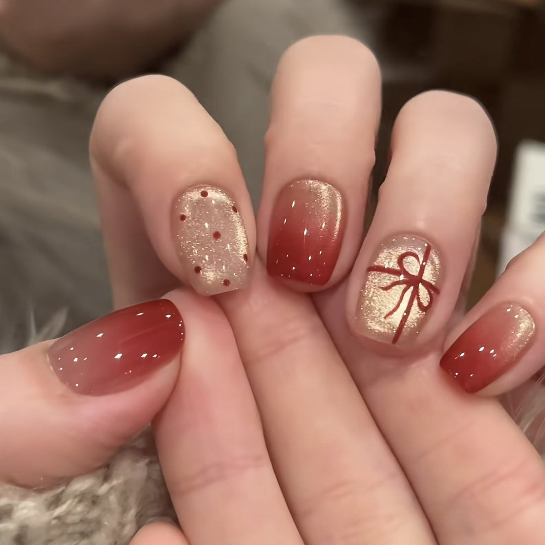 Artificial nails with festive gradient color and elegant decorations Kalsten