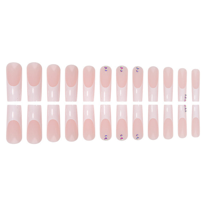 Nail set with elegant French tips and sparkling rhinestone embellishments Kalsten