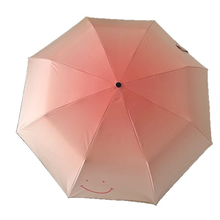 Women's foldable umbrella with playful design and handy wooden handle Kalsten