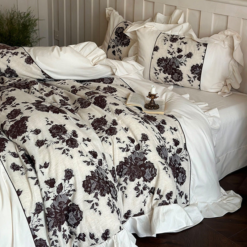 Romantic bedding set made of cotton-linen blend with floral jacquard border and ruffle