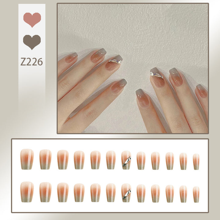 Artificial nail set with elegant ombre design and sparkling applications Kalsten