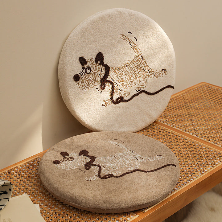 Round padded seat cushion with embroidered cat motif
