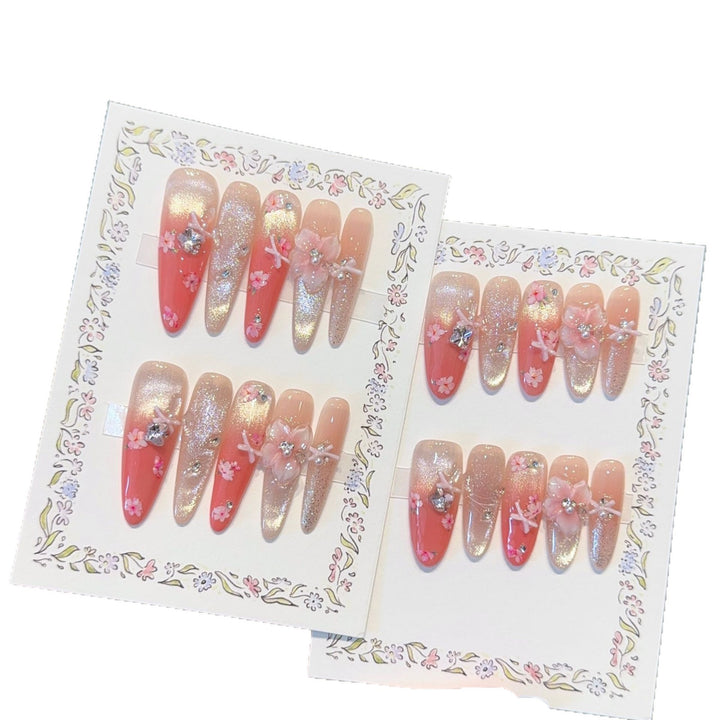Artificial nails with floral embellishments and glitter effects Kalsten