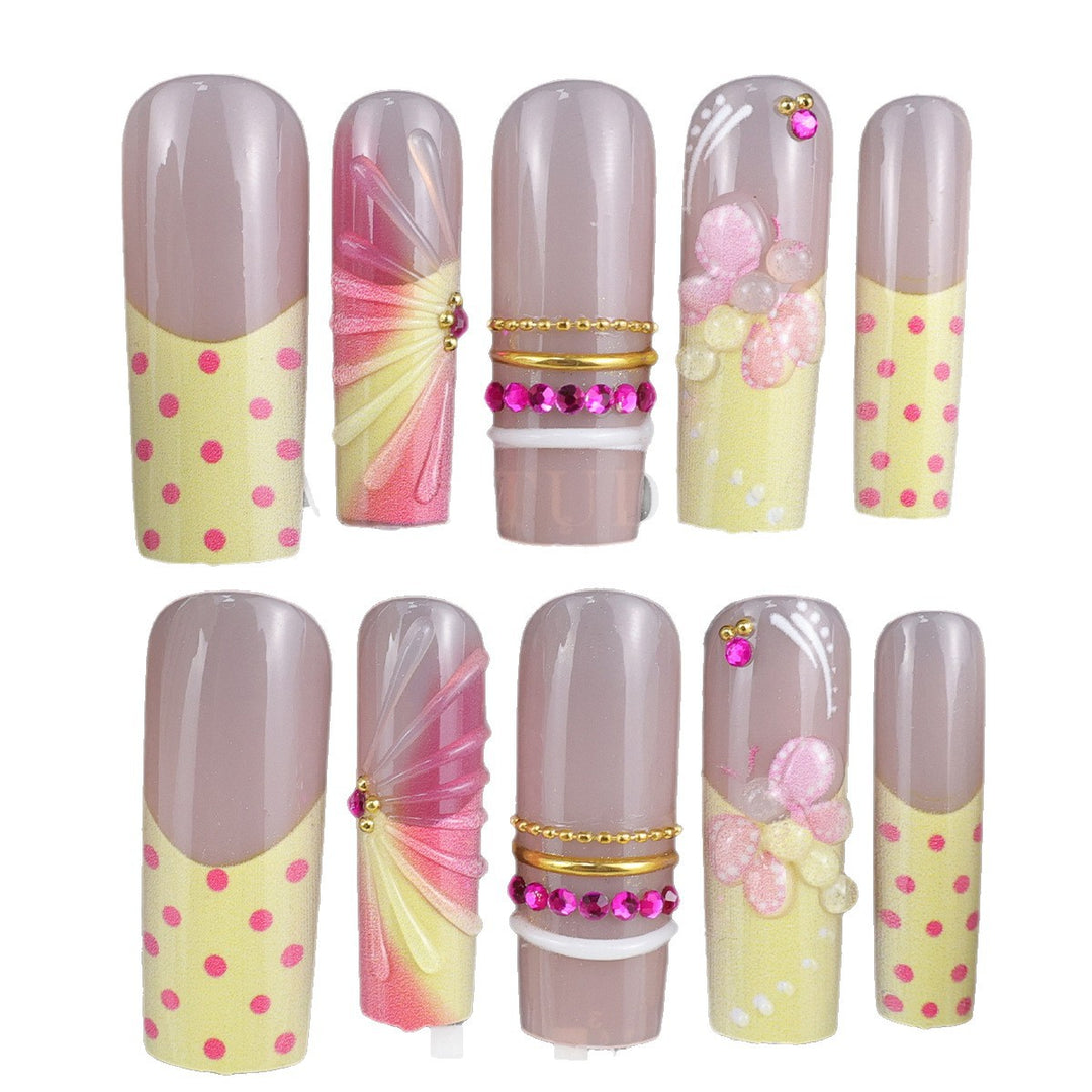 Artificial nail set with romantic flowers and playful accents Kalsten