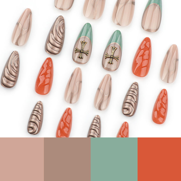 Artful stiletto nails with glitter and motif decorations Kalsten