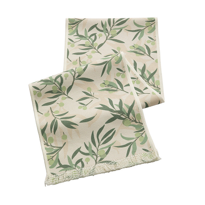 Woven table runner with floral jacquard pattern and fringed edge Kalsten