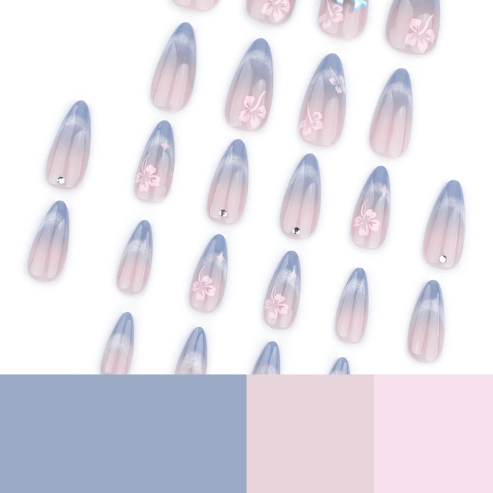Artful nail extensions with elegant ombré design and floral accents Kalsten
