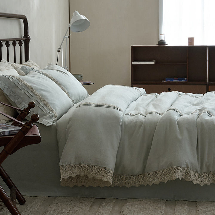 High-quality linen bedding set with handcrafted crochet lace, box pleats, and integrated bed skirt