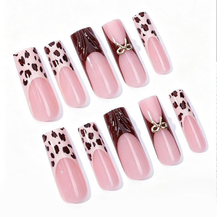 Nail set with stylish leopard pattern and elegant accents Kalsten