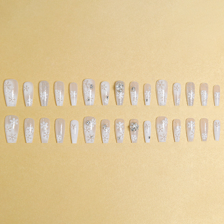 Artificial nail set with frosty snowflake design and sparkling 3D applications Kalsten