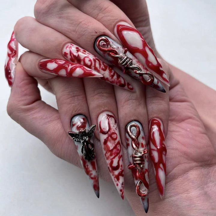 Creative Stiletto Nail Art with Blood Red Accents Kalsten