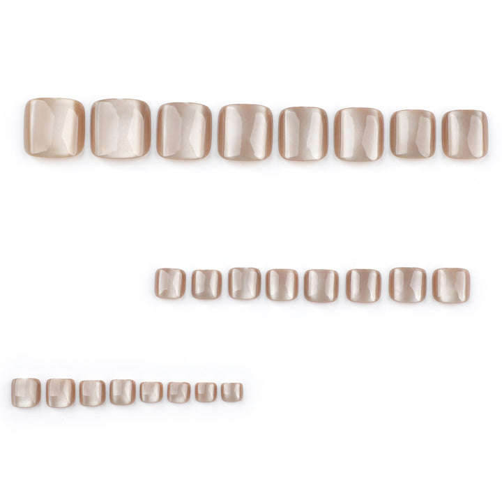 Artful toenail design with glossy accents Kalsten