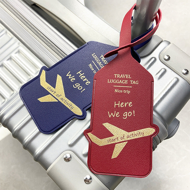 premium leather travel luggage ID tag with embossed airplane motif and adjustable strap Kalsten