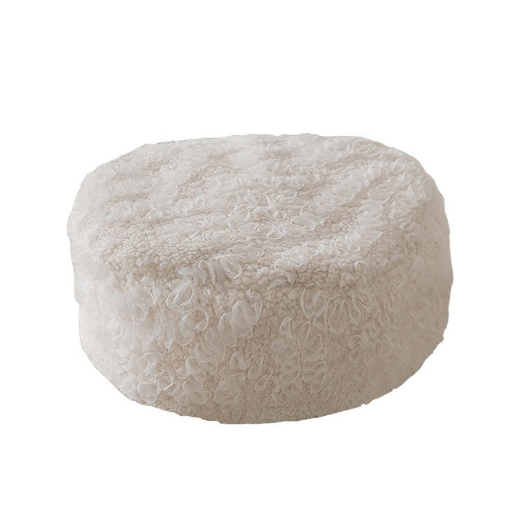 Beef hand-woven pouf with floral print and padded seat surface