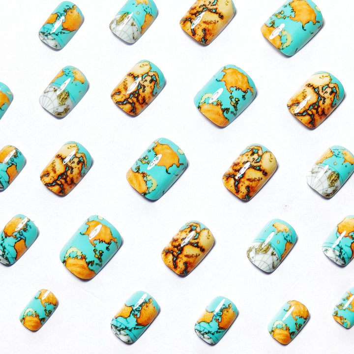 Creative artificial nails with world map inspired design Kalsten