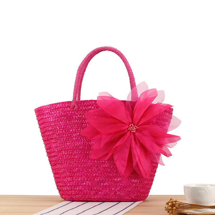 Elegant straw bag with floral accents Kalsten