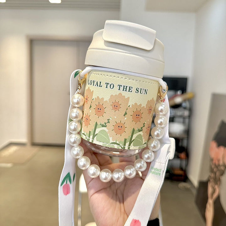 Women's insulated bottle with practical pearl carrying strap Kalsten