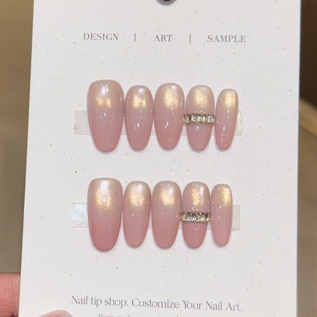 Glamorous artificial nails with elegant glitter and rhinestone application Kalsten