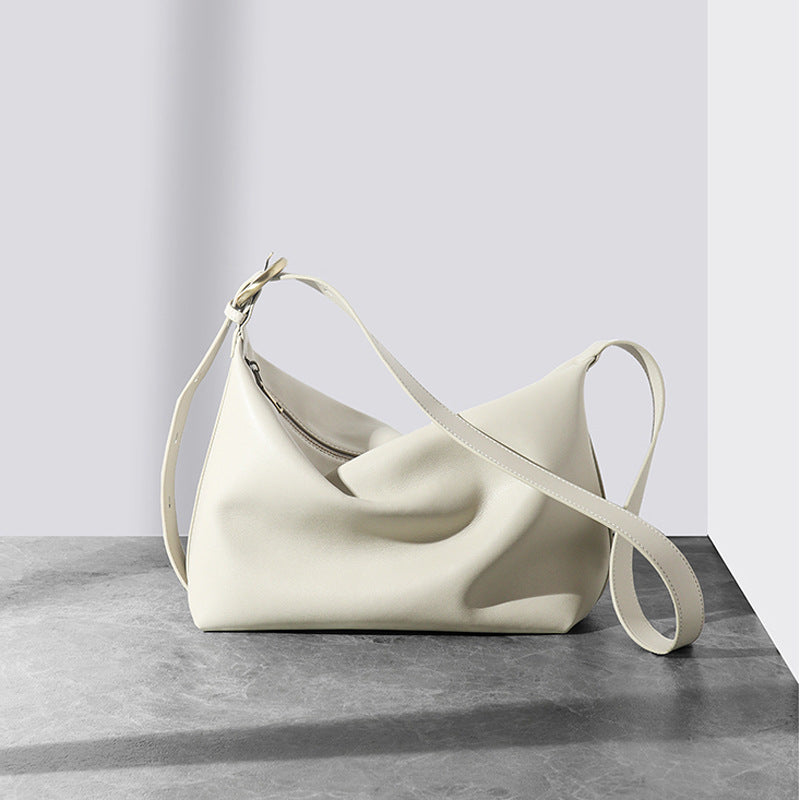 Minimalist Curved Leather Shoulder Bag with Adjustable Strap