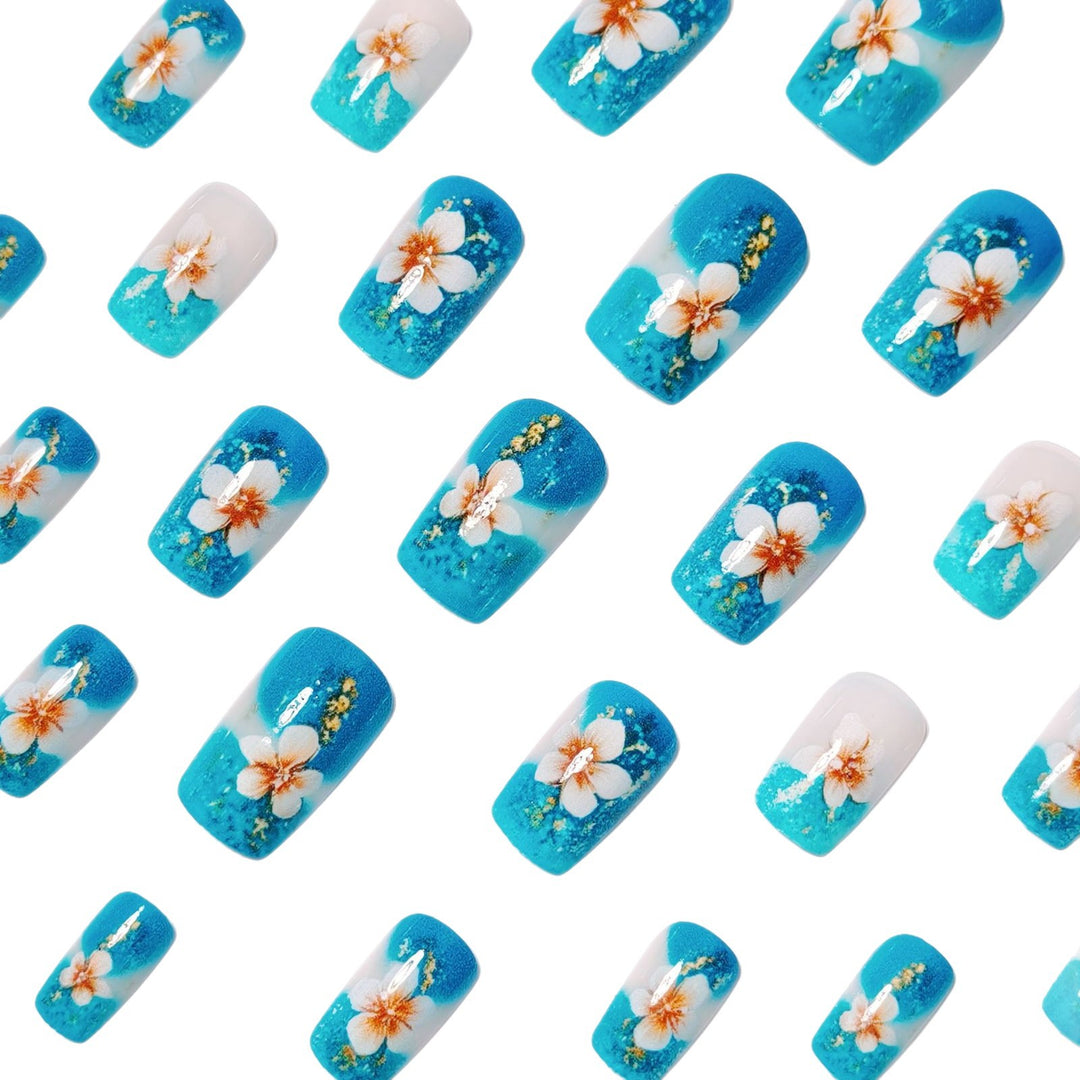 Artificial nails with floral accents and glitter patterns Kalsten