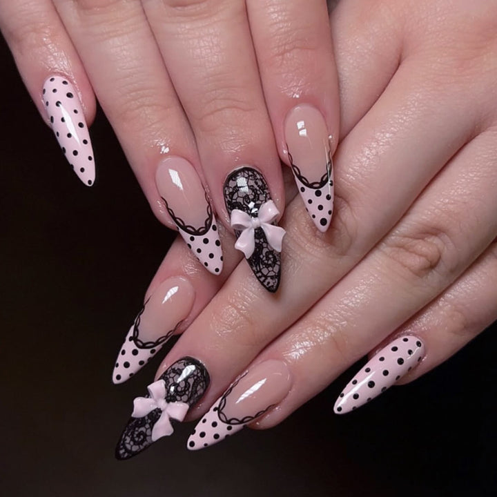 Elegant and artistic stiletto nails with tips and bows Kalsten