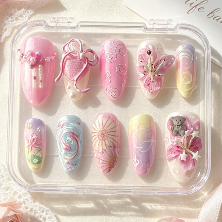 Creative nail art set with floral and playful designs Kalsten