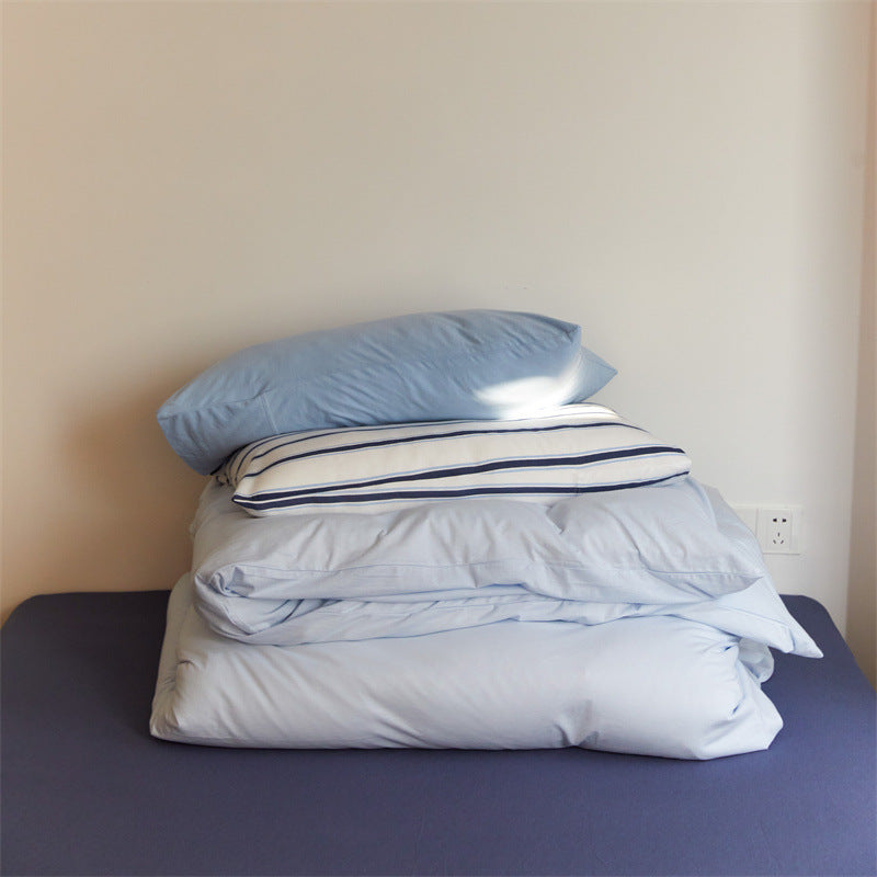 Bedding set made of cotton percale with striped pillowcase and smooth duvet cover