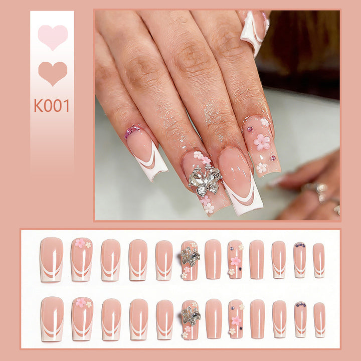 Artificial nails with floral accents and glitter effects Kalsten