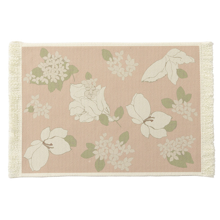 Floral woven bath mat with decorative fringes Kalsten
