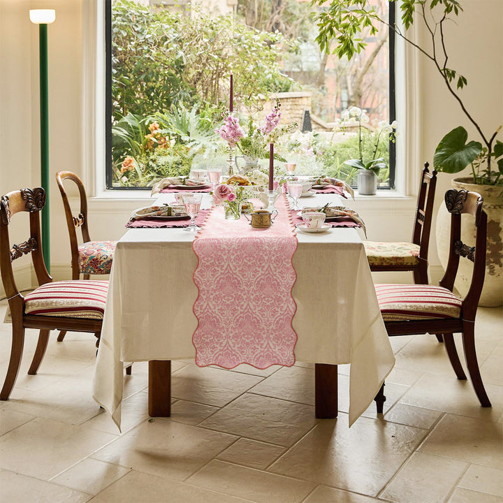 Damask-style table runner with curved wave edge and fine ornamental print Kalsten