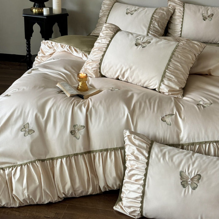 Elegant bedding set made of cotton satin with embroidered butterflies and pleated bed skirt